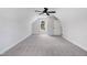 A spacious upstairs bedroom with a ceiling fan and natural light at 186 Gumtop Dr, Zebulon, NC 27597