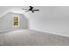 Bright room offering natural light, a ceiling fan, and neutral carpeting at 186 Gumtop Dr, Zebulon, NC 27597