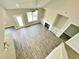 Spacious living room with a fireplace, built-in shelving, and abundant natural light at 186 Gumtop Dr, Zebulon, NC 27597