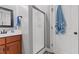 Bathroom featuring a white sink, vanity, walk-in shower, and tile flooring at 205 Sacred Fire Rd, Louisburg, NC 27549