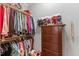 Walk-in closet with shelving and dresser for storage at 205 Sacred Fire Rd, Louisburg, NC 27549