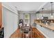Bright dining area featuring hardwood floors and natural light from the window at 205 Sacred Fire Rd, Louisburg, NC 27549