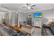 Cozy living room with hardwood floors, neutral paint, tv, and comfortable seating at 205 Sacred Fire Rd, Louisburg, NC 27549