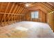 Unfinished attic space, offering potential for customization and additional storage at 2106 Cloud Cover Ln, Raleigh, NC 27614