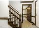 Entryway featuring a wooden staircase, stained trim and a view into the home's interior at 2122 Pleasant Hill Rd, Rocky Mount, NC 27801