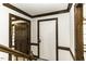 Entryway with white walls, stained trim, and staircase to the left at 2122 Pleasant Hill Rd, Rocky Mount, NC 27801