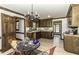 The kitchen's breakfast nook features an eating area, laminate flooring, and craftsman trim at 2122 Pleasant Hill Rd, Rocky Mount, NC 27801