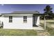Outbuilding with a garage door and white siding at 2122 Pleasant Hill Rd, Rocky Mount, NC 27801