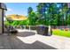 Spacious back deck with outdoor seating, BBQ grill, and green lawn create a relaxing outdoor living space at 215 Terrell Dr, Rolesville, NC 27571