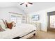 Bedroom with vaulted ceiling, carpet flooring, tv and view from the window at 215 Terrell Dr, Rolesville, NC 27571