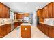 Beautiful kitchen with stainless steel appliances, granite countertops, and custom cabinetry, perfect for culinary enthusiasts at 215 Terrell Dr, Rolesville, NC 27571