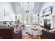 Bright living room with vaulted ceilings, a fireplace, and a view of the backyard at 215 Terrell Dr, Rolesville, NC 27571