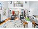 Spacious living area with an open floor plan, large windows, and hardwood flooring, offering a bright and airy feel at 215 Terrell Dr, Rolesville, NC 27571