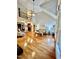 Spacious living room with gleaming hardwood floors, vaulted ceiling, and an open layout at 215 Terrell Dr, Rolesville, NC 27571