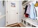 Mudroom boasts built-in storage, bench seating, and decorative accents for an organized entryway at 215 Terrell Dr, Rolesville, NC 27571