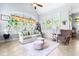 Sun-drenched sunroom with vaulted ceilings, a ceiling fan, and an array of windows, creating a cozy atmosphere at 215 Terrell Dr, Rolesville, NC 27571