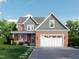 Charming two-story home with a brick facade, gray shingles, attached two-car garage, and a well-manicured lawn at 238 W Paige Wynd Dr, Angier, NC 27501