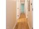 Hallway with hardwood floors and doorways at 2506 N Duke St, Durham, NC 27704