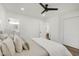 Bedroom features a view into the bathroom, and wood floors throughout at 2704 Dove Ln, Raleigh, NC 27604