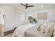Bedroom features wood floors, closet, ceiling fan and a connecting bathroom at 2704 Dove Ln, Raleigh, NC 27604