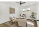 Bright office features white walls, wood floors, lots of natural light, and a ceiling fan at 2704 Dove Ln, Raleigh, NC 27604
