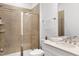 Bathroom features tiled shower with glass door, a toilet, and a vanity with a sink at 2749 Nettles Ridge Way, Fuquay Varina, NC 27526