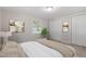 Comfortable bedroom with neutral tones, closet space and natural lighting at 2806 Shaftsbury St, Durham, NC 27704