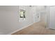 Living room showcasing wood-look floors, natural light, and neutral paint at 2806 Shaftsbury St, Durham, NC 27704