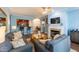 Cozy living room with a fireplace, open to the kitchen and dining area, perfect for relaxed living at 2810 Bedford Green Dr # 207, Raleigh, NC 27604