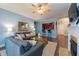 Comfortable living room flowing into the kitchen area, featuring modern decor and a cozy atmosphere at 2810 Bedford Green Dr # 207, Raleigh, NC 27604
