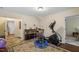 Inviting bonus room featuring a piano, exercise equipment, and neutral color palette at 3009 Weston Green Loop, Cary, NC 27513