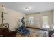 Bright bonus room featuring exercise equipment, decorative rug and ample natural light at 3009 Weston Green Loop, Cary, NC 27513