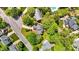 Aerial view of a charming neighborhood with mature trees and well-maintained homes at 311 Arlington Rdg, Cary, NC 27513