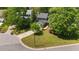 Beautiful home with mature landscaping and a lush green lawn at 311 Arlington Rdg, Cary, NC 27513