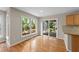 Bright dining area with large windows and sliding doors leading to outdoor space at 311 Arlington Rdg, Cary, NC 27513