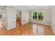 Dining area with a view to the kitchen and sliding glass doors to the deck at 311 Arlington Rdg, Cary, NC 27513