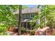Charming home featuring an inviting screened porch and a wooden deck for outdoor enjoyment at 311 Arlington Rdg, Cary, NC 27513