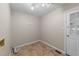 Functional mud room with tile flooring and a door leading to the exterior at 311 Arlington Rdg, Cary, NC 27513