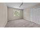 Cozy bedroom with a window and double door closet at 311 Arlington Rdg, Cary, NC 27513