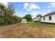 Wide backyard view with a shed at 326 W Gilbreath St, Graham, NC 27253