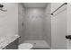 Updated bathroom with tiled shower, granite counters, and modern fixtures at 326 W Gilbreath St, Graham, NC 27253