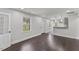Inviting living room with hardwood floors, ample natural light, and open layout at 326 W Gilbreath St, Graham, NC 27253