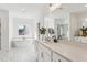 Spacious bathroom featuring double vanity, soaker tub, and a glass enclosed shower at 3297 Oakfields Rd # 1, New Hill, NC 27562