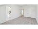 Spacious bedroom with neutral walls leads to an ensuite bathroom at 3297 Oakfields Rd # 1, New Hill, NC 27562