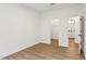 Unfurnished bedroom with hardwood floors featuring a walk-in closet at 3297 Oakfields Rd # 1, New Hill, NC 27562