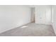 Bedroom featuring neutral carpet, bright walls and a closet at 3297 Oakfields Rd # 1, New Hill, NC 27562