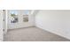 A light-filled bedroom with carpeting and multiple windows offering natural lighting at 3297 Oakfields Rd # 1, New Hill, NC 27562