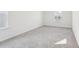 Bedroom featuring neutral carpet, clean walls, and a bright window at 3297 Oakfields Rd # 1, New Hill, NC 27562