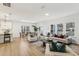 Open concept living space with a modern kitchen, dining area, and cozy living room at 3297 Oakfields Rd # 1, New Hill, NC 27562