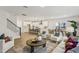Open concept living space with a modern kitchen, dining area, and cozy living room at 3297 Oakfields Rd # 1, New Hill, NC 27562